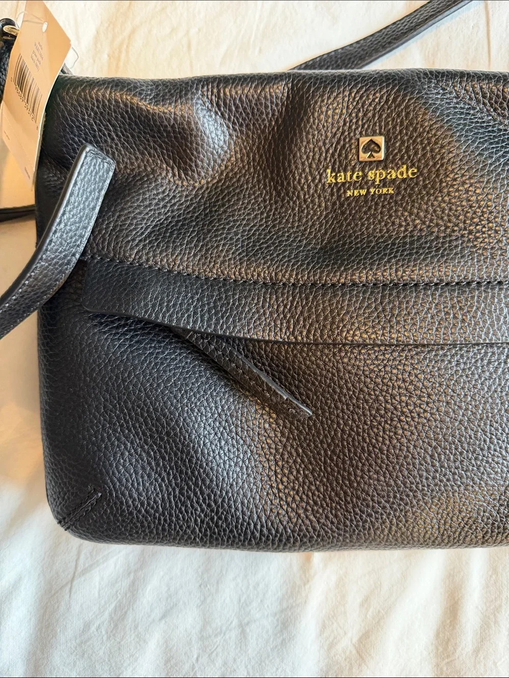 Kate Spade Starla black pebbled leather crossbody with gold logo